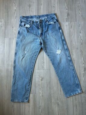 Wrangler Light Blue Relaxed Fit Distressed Jeans